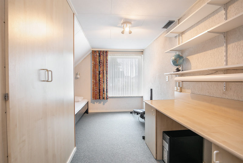 De tweede slaapkamer