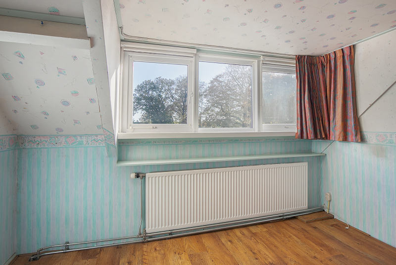 De tweede slaapkamer