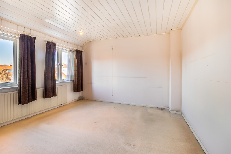 De tweede slaapkamer