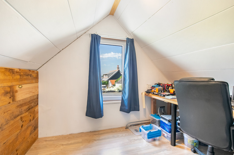 De tweede slaapkamer